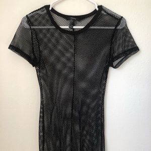 Black form fitting net dress